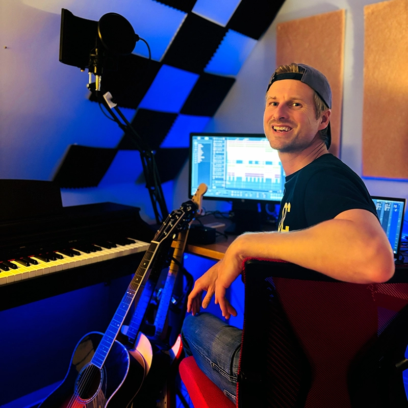 This is an image of Tristan Hutton in his studio working on SoundBridge.
