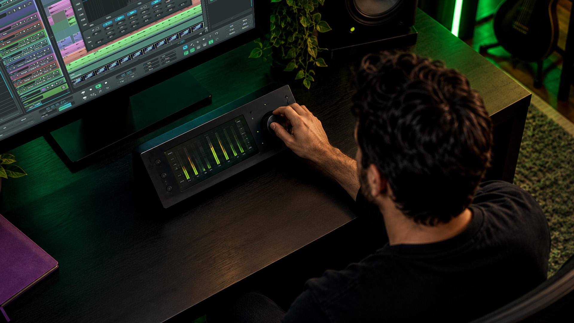 An engineer verifying a loudness meter calibration