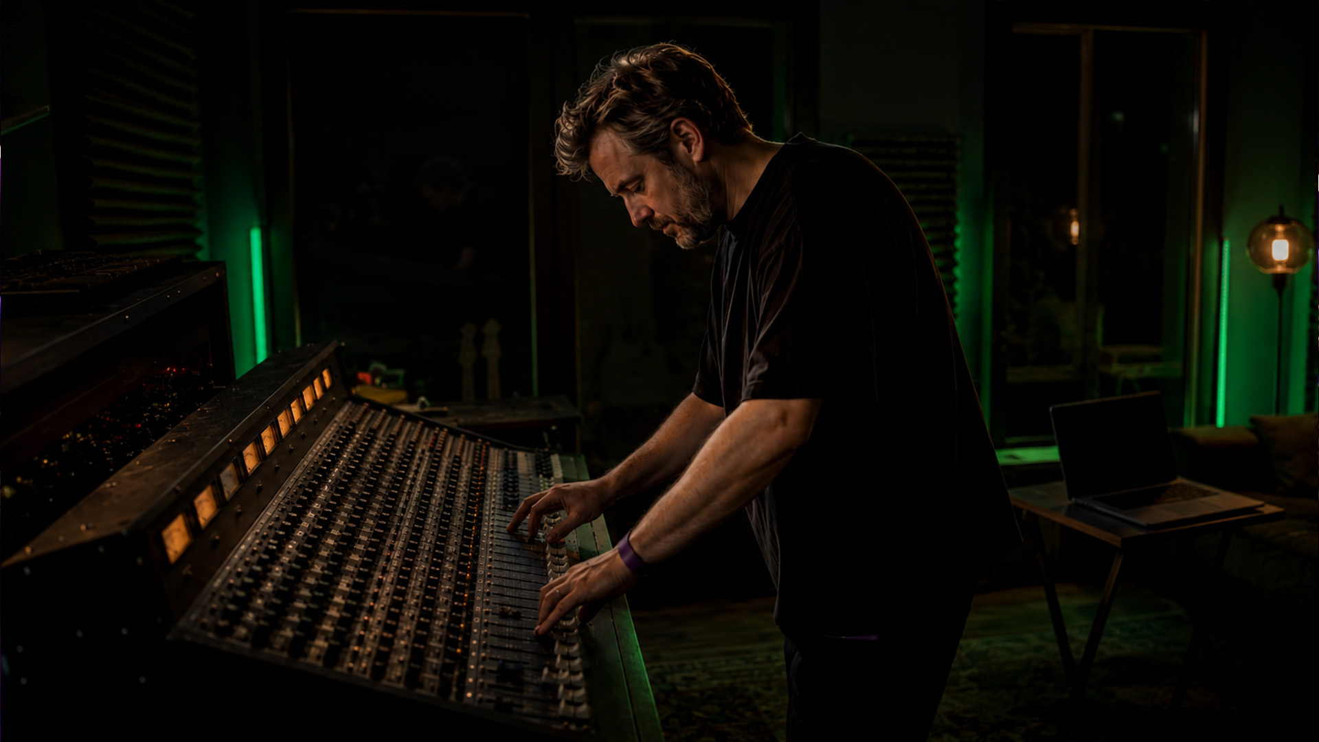 An audio engineer mixing immersive audio in a home studio