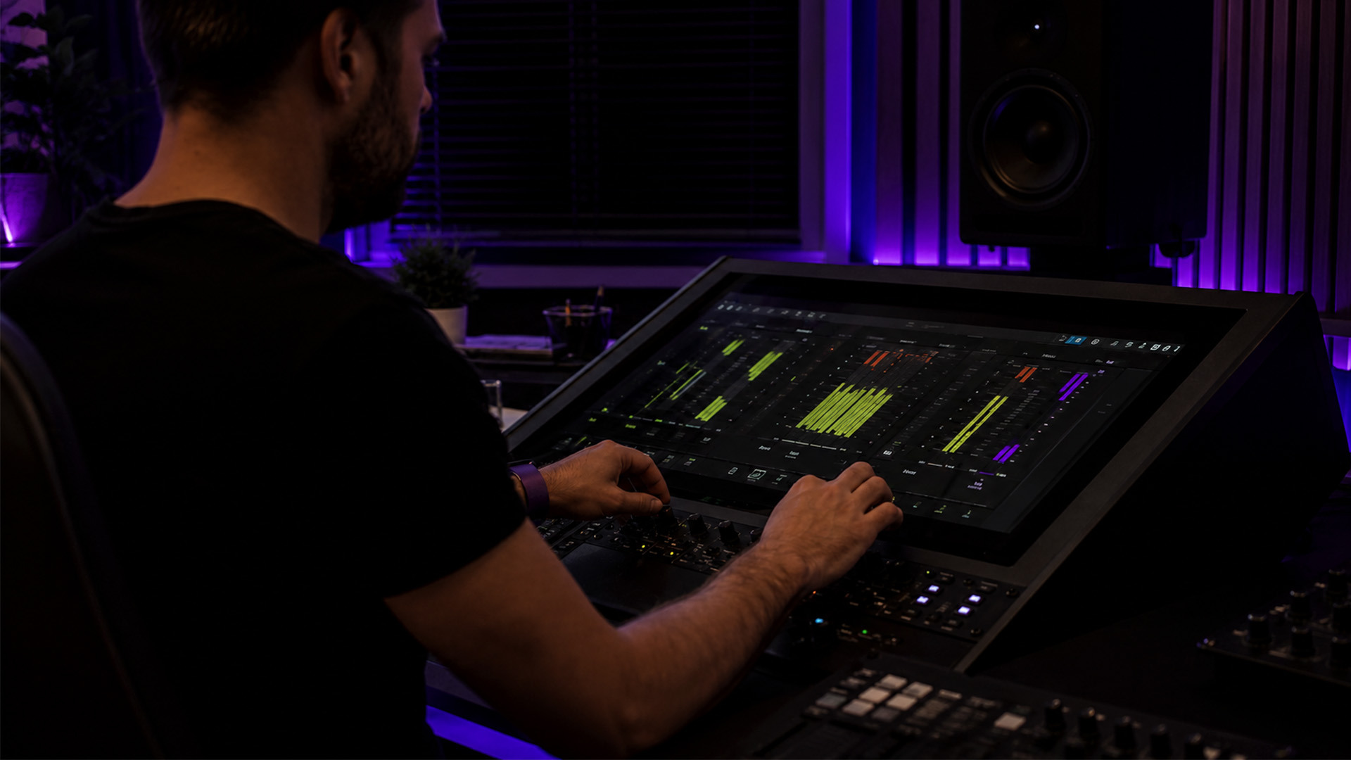 Close-up hands using a digital loudness meter