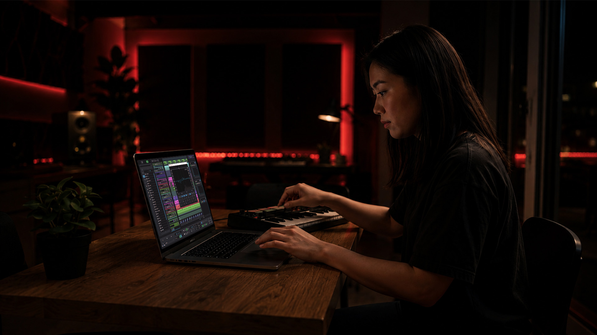 Hands mastering on a home studio computer