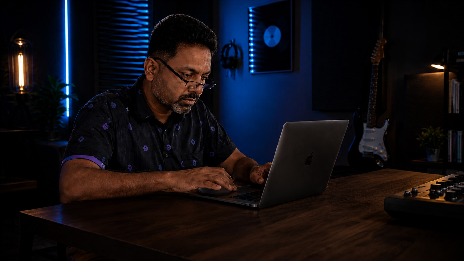 An educator using SoundBridge on a MacBook at home