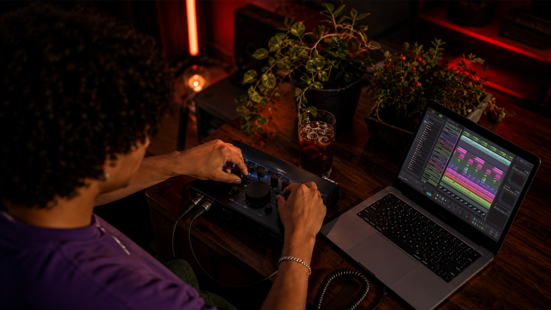 Overhead view of hands using music shortcuts